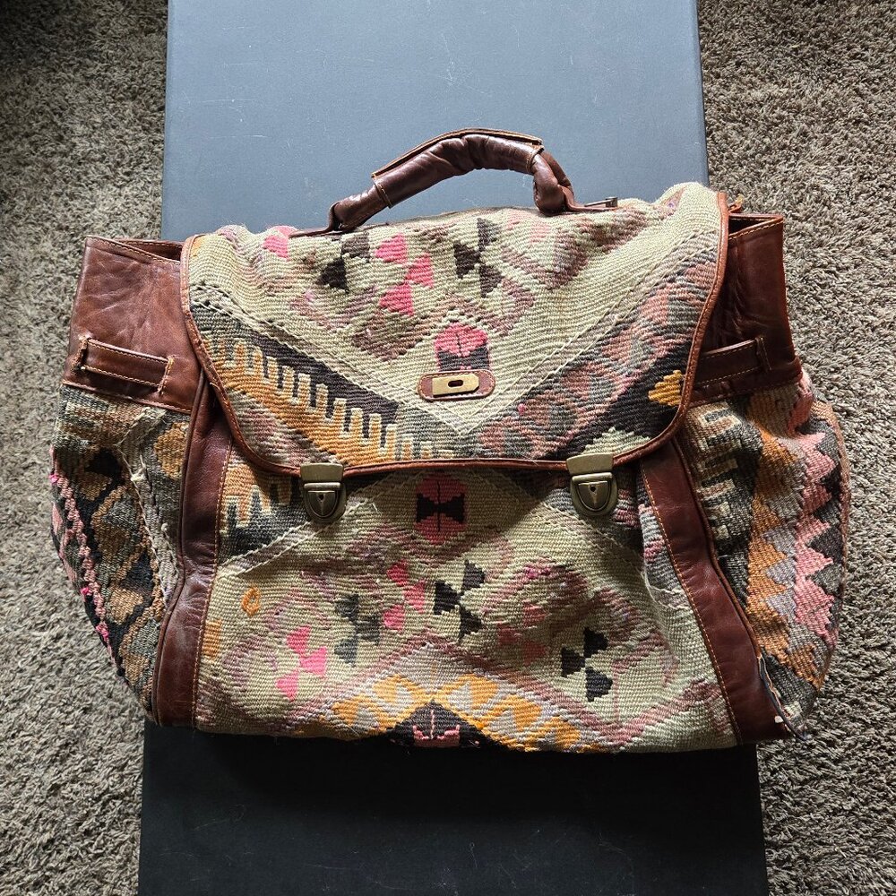 Gorgeous patterned Carpet bag, leather one handle, two intact buckles.